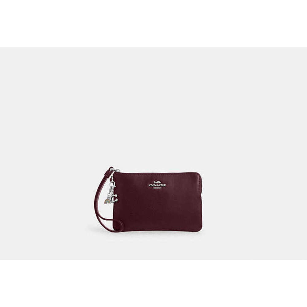 COACH Boxed Plum Wristlet With Charms NWT - Picture 3 of 3